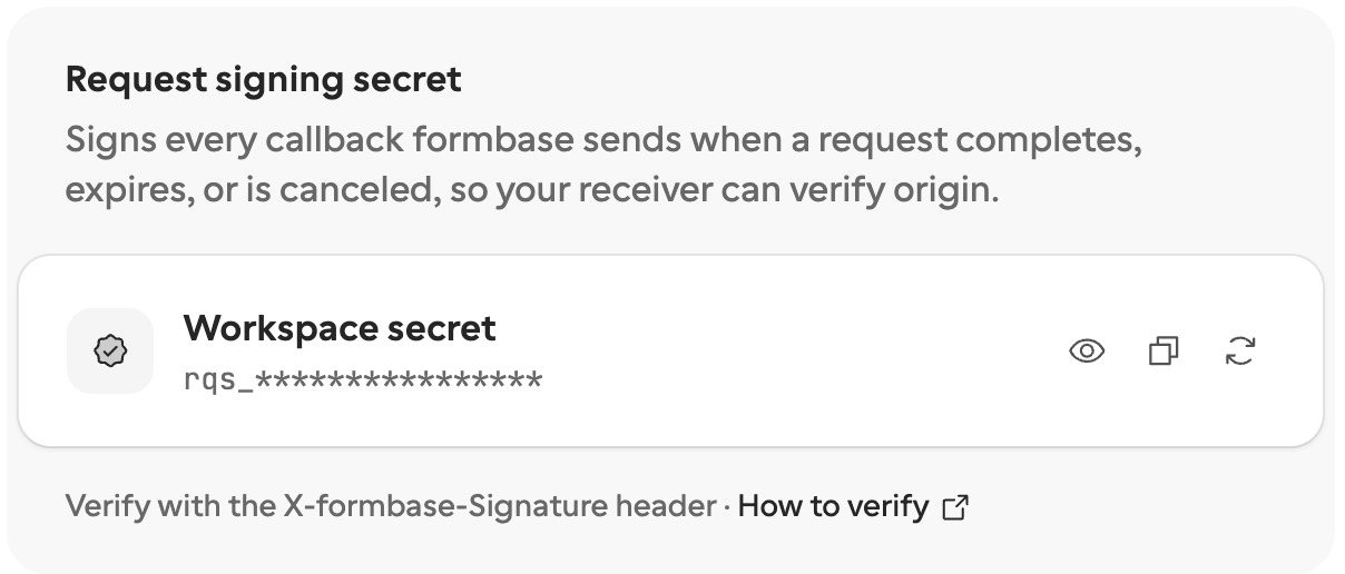 The Request signing secret card: Workspace secret, masked as rqs_ followed by asterisks, with buttons to reveal, copy and regenerate it